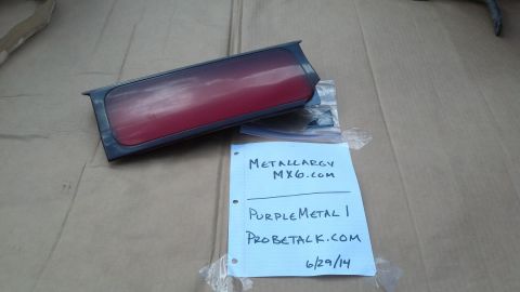 1994 Ford Probe - A red taillight assembly is shown with a handwritten note containing website information and a date.