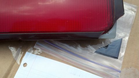 1994 Ford Probe - Close-up of a red taillight assembly, part of a vehicle component being sold.