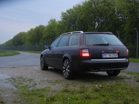 2003 Audi A6 - Audi A6 Avant wagon, license plate PB WG 2006, parked on a dirt road with trees and a fence in the background.