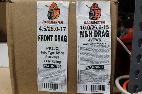 2003 Ford Crown Victoria - M&H Racemaster drag tire box labels listing tire sizes, construction specs and warranty warnings.