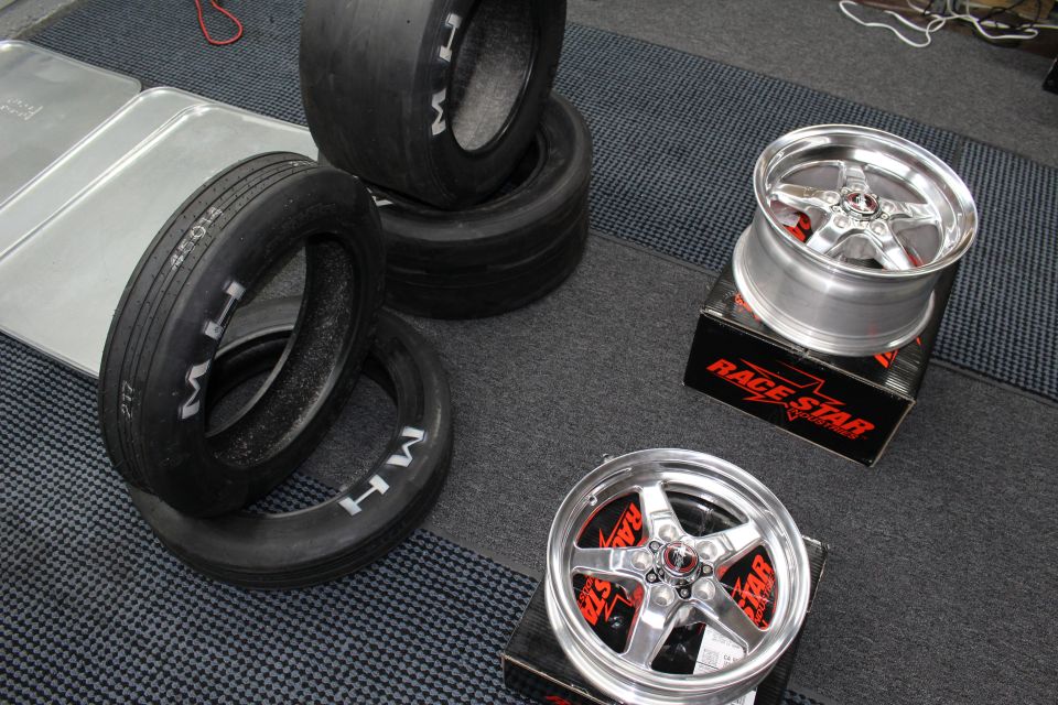M/H drag slicks and two polished Race Star five-spoke wheels on boxes