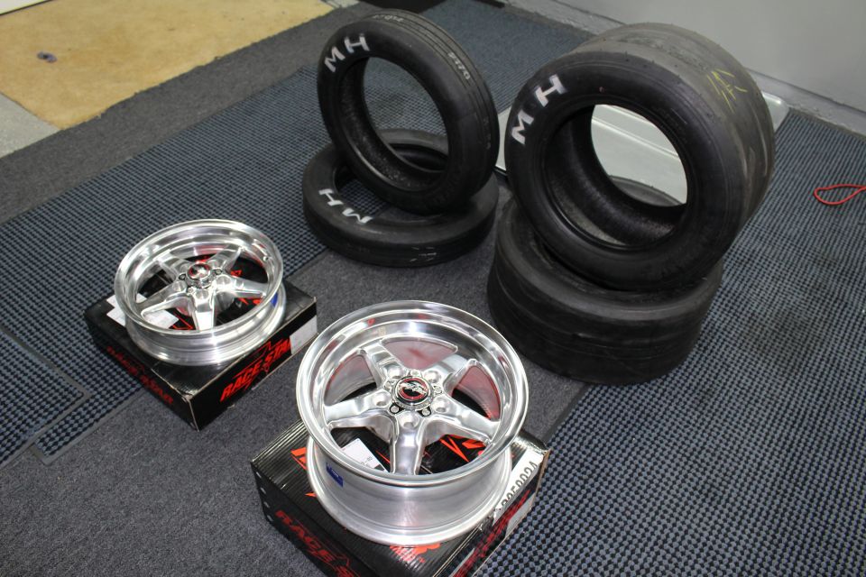 Polished Race Star five-spoke wheels and stacked M/H drag tires