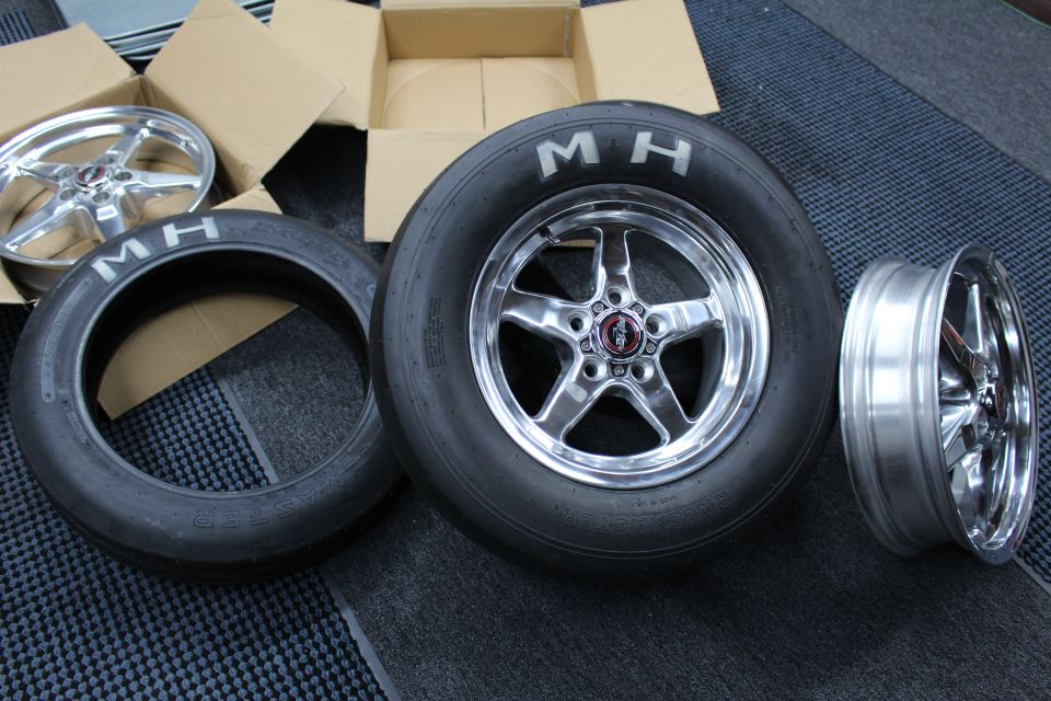 Polished wheel on MH slick, a bare drag wheel, and a skinny MH tire on a mat