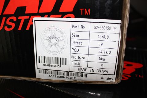 2003 Ford Crown Victoria - white spec label on a wheel box listing part 92-580150 DP, size 15x8.0, offset 19, 5x114.3 PCD, 78mm hub bore.