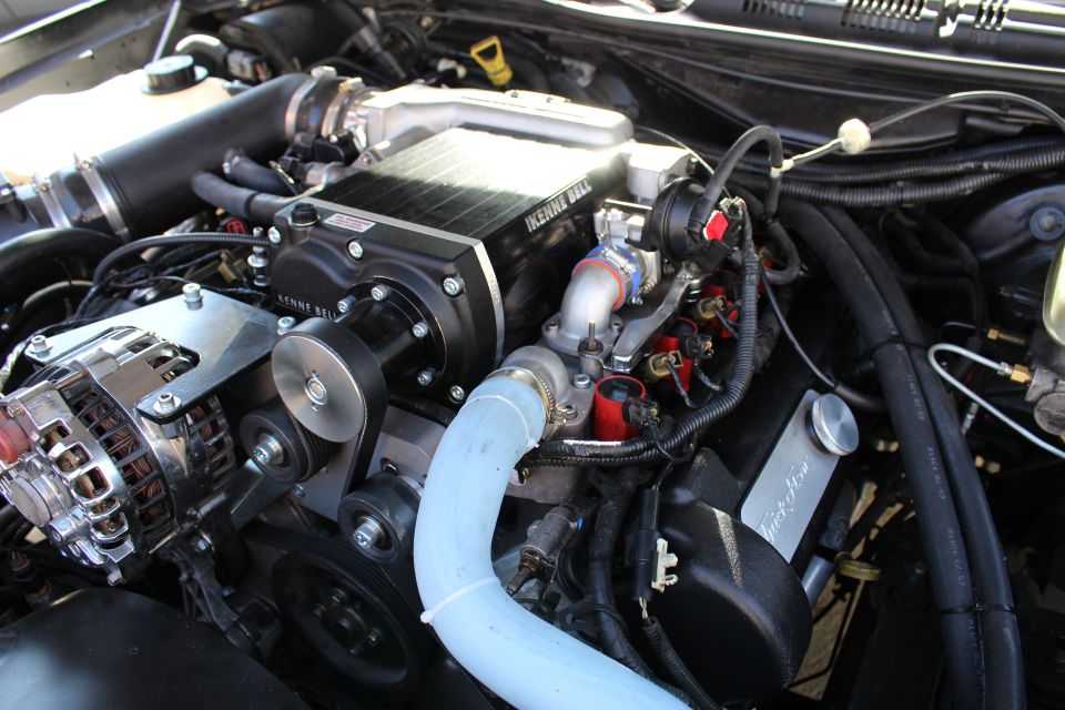 Kenne Bell supercharger with light-blue silicone intake hose