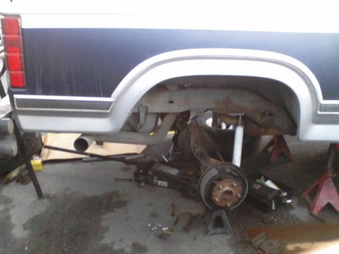 1986 Ford Bronco - Rear suspension and axle removed from a 1986 Ford Bronco for maintenance.