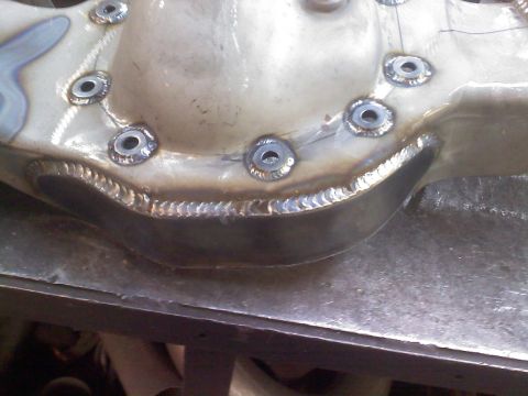 1986 Ford Bronco - A close-up view of a welded differential cover, showing the results of metalworking.