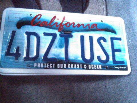 1986 Ford Bronco - A California license plate with a marine theme is shown, displaying the registration number 4DZT USE.
