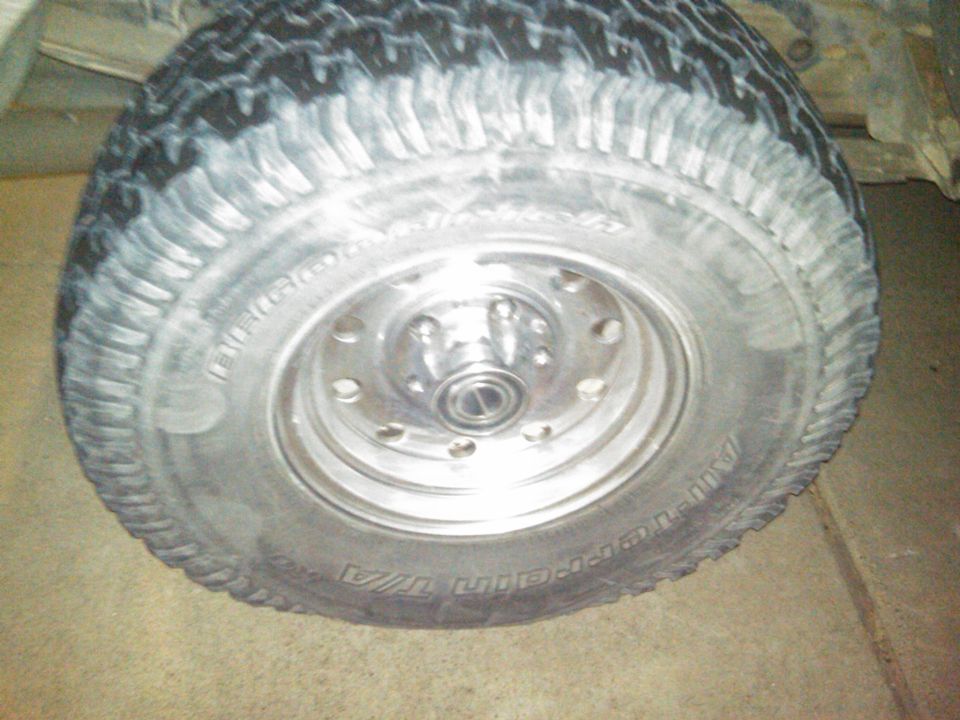Tire and chrome wheel on a vehicle, close-up view