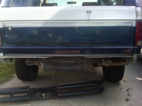 1986 Ford Bronco - Rear view of a 1986 Ford Bronco with side steps removed.