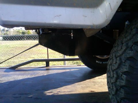 1986 Ford Bronco - Close-up of the rear suspension and tire on a 1986 Ford Bronco.