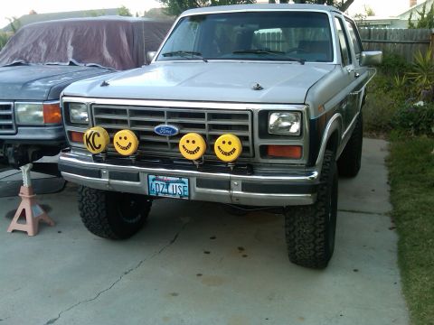 1986 Ford Bronco - Front view of a 1986 Ford Bronco, equipped with KC lights and a custom license plate.