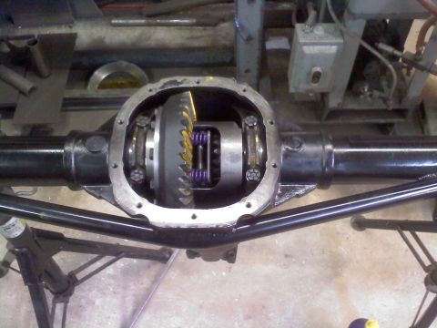 1986 Ford Bronco - Close-up view of an open differential housing, showing internal gears and springs.