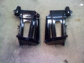 1986 Ford Bronco - Two black metal brackets are shown against a concrete floor, with a SuperMotors.net watermark.