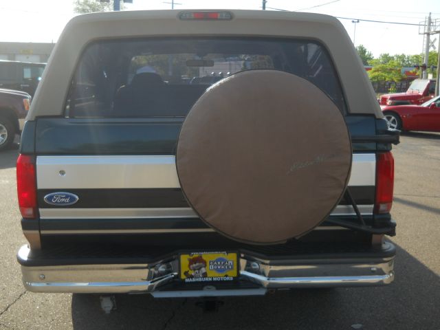 1994 Ford Bronco rear view with spare tire cover and Ford logo