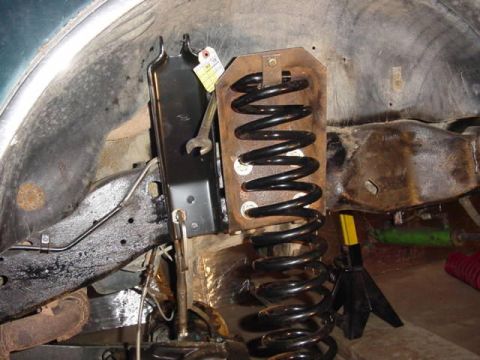 1992 Ford Bronco - Close-up of suspension components, likely during a repair or upgrade process.