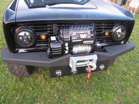 1979 Ford Bronco - This black Ford Bronco features a prominent winch and supercharger, suggesting modifications beyond its original 1978 model year.