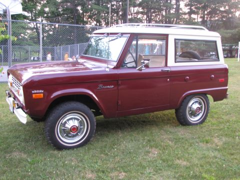 1979 Ford Bronco - This classic Ford Bronco is shown from the side, with its distinctive Bronco badging visible on the fender.