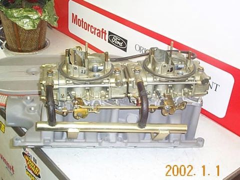 1964 Ford Fairlane - Dual carburetors and intake manifold assembly, likely a performance upgrade part.