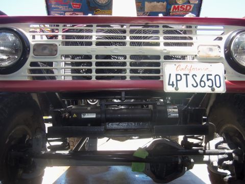 1968 Ford Bronco - Front view of a Ford Bronco, a prominent winch mounted below the grille.