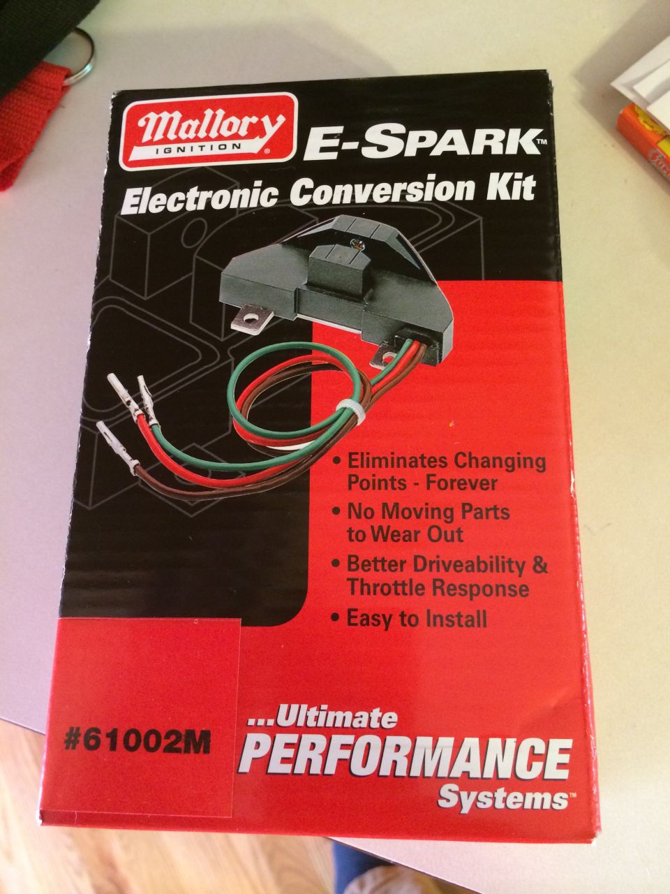 Mallory E-Spark Electronic Conversion Kit box with part image and product benefits listed