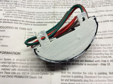 1973 Ford Torino - Mallory electronic ignition module with wires, shown on top of its instruction manual.