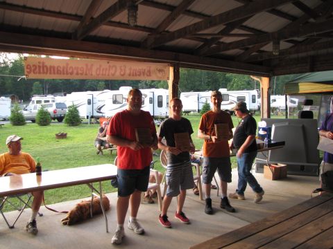 1979 Ford Bronco - An outdoor event appears to be awarding participants, with several recreational vehicles visible in the background.