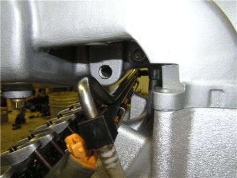 1993 Ford Bronco - Close-up view of engine fuel injectors and intake manifold components, likely during a rebuild or maintenance.