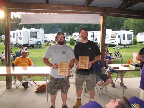 1979 Ford Bronco - Men receive awards at an outdoor event, with RVs parked in the background.