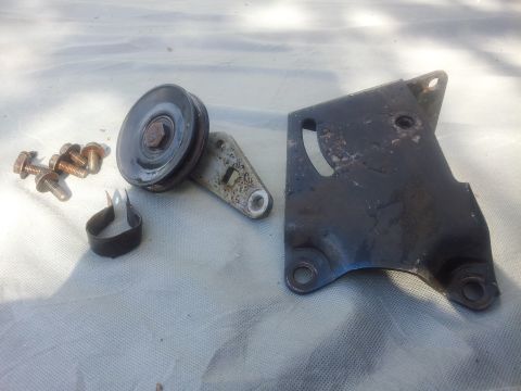 1976 Ford Ranchero - Air conditioning bracket and pulley assembly with hardware.