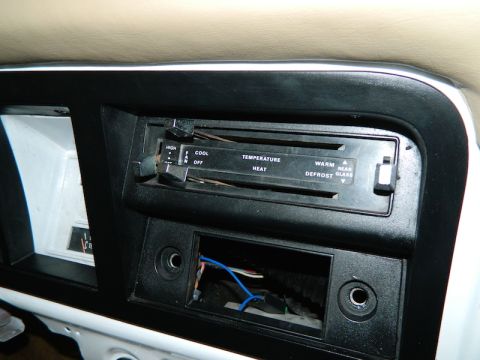 1979 Ford Bronco - The climate control panel shows settings for temperature, fan speed, and defrost options.