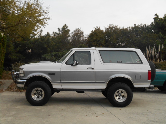 1994 Ford Bronco, two-tone silver and white, side view