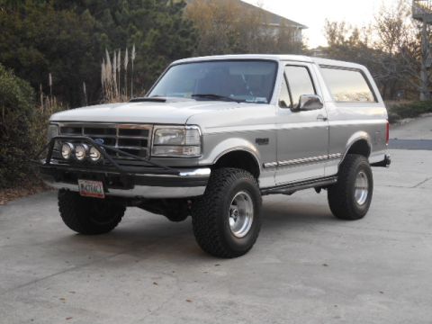 1994 Ford Bronco - This 1994 Ford Bronco is equipped with a brush guard and large off-road tires.