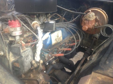 1970 Ford F-250 - Close-up view of a V8 engine, showing various components and wiring.