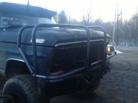 1970 Ford F-250 - This Ford F-250 features a heavy-duty brush guard and large tires, suggesting off-road use.