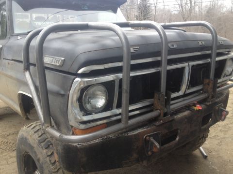 1970 Ford F-250 - This Ford F-250 features a heavy-duty aftermarket bumper and grille guard, suggesting off-road use.