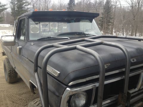 1970 Ford F-250 - This 1970 Ford F-250 is equipped with a heavy-duty brush guard and a visor above the windshield.