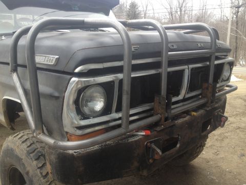 1970 Ford F-250 - This 1970 Ford F-250 features a heavy-duty brush guard and a aftermarket bumper, suggesting off-road modifications.