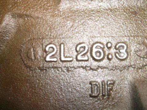 1963 Ford Galaxie - Close-up of a cast iron part showing stamped identification numbers.