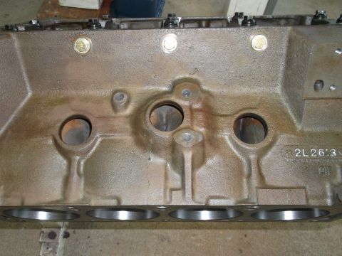 1963 Ford Galaxie - This is a close-up view of an engine block, showing its internal structure and some stamped markings.