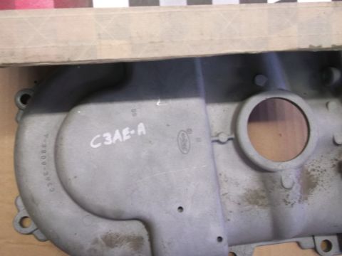 1963 Ford Galaxie - A metal engine component with part numbers and a Ford emblem is visible.
