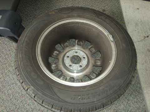 2004 Mercury Grand Marquis - A single wheel and tire assembly is shown, with the tire's brand visible.