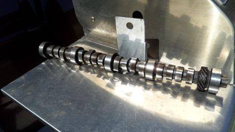 1972 Ford Ranchero - A camshaft is shown, a critical component in internal combustion engines.