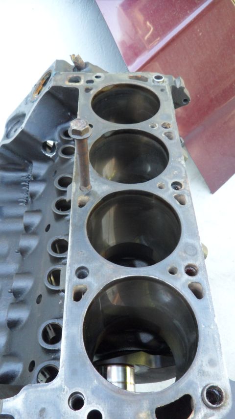 1972 Ford Ranchero - This is a close-up view of an engine block, showing the cylinder bores and a protruding bolt.