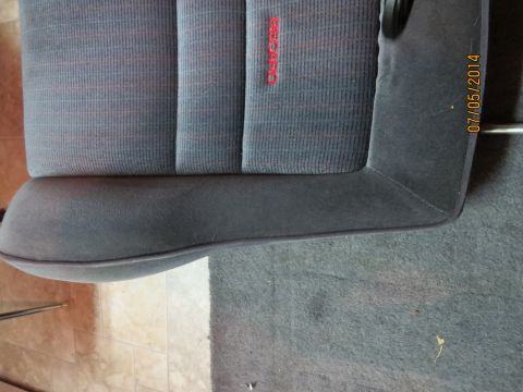 1985 Volkswagen GTI - Car seat interior detail Recaro branding and a visible date stamp.