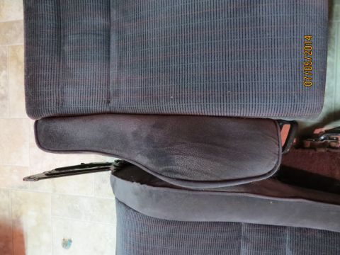 1985 Volkswagen GTI - A close-up view of a car seat, possibly a Recaro seat, with a visible date stamp.