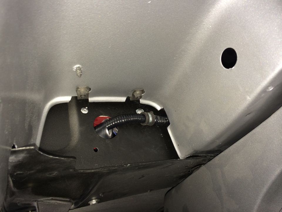 1965 Mustang DS fender headlight pocket notched for wire harness