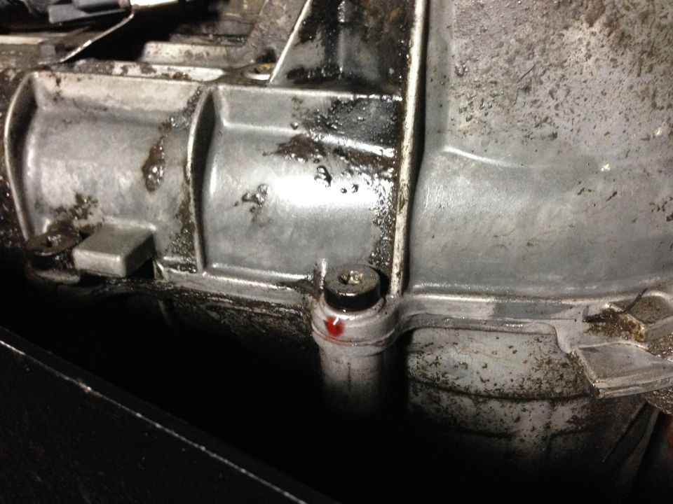 Transmission fluid leak from a metal component with a screw