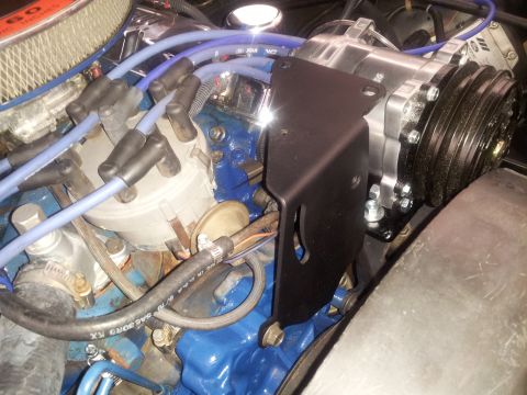 1976 Ford Ranchero - The engine bay features a newly installed air conditioning compressor and associated plumbing.