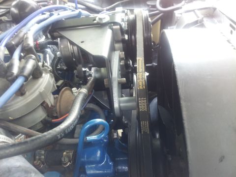 1976 Ford Ranchero - A view of the engine bay, focusing on the drive belts and pulleys.